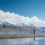 women at Pangong lake and mountain in Leh Ladakh, India
